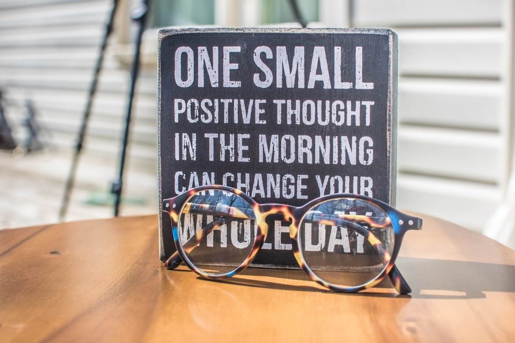 photo of a sign and eyeglasses on table 1485657 1